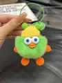 Green plush duck keychain with yellow knit hat and orange feet for bag decoration - Green