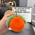 Detail of plush peach keychain showing soft faux fur texture and gold metal ring hook - Orange (Water-drop Buckle)