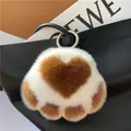 Cute brown and white faux fur heart shaped kitten paw keychain with golden ring - Caramel color