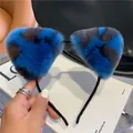 Detail van de blauwe luipaardprint kattenoren hoofdband met zachte pluche textuur en grip - Blauw Luipaard
