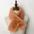 Plush faux fur cross scarf in camel color shown on a mannequin for winter warmth - Camel