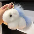 Close-up of white and blue plush unicorn charm with gold horn and soft faux fur texture - Sky Blue (Round Clasp)