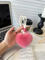 Pink heart-shaped faux rabbit fur plush charm with orange buckle on white cord - Rose Pink
