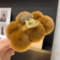 Brown faux rabbit fur plush claw clip hair accessory with a large shark clip design - Caramel Coffee