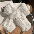 Close-up of plush white faux fur scarf with soft curly texture and cross-loop detail - White