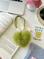 Detail of plush heart-shaped keychain in avocado green with braided rope attachment - Avocado Green