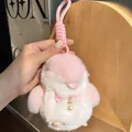 Detail of pink and white plush penguin charm with silk bow and pearl pendant - Light Pink