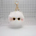 Plush white cat head keychain with soft fur, pink blush detail and gold lobster clasp - White