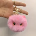 Pink fluffy cat plush keychain with soft fur texture and golden metal lobster clasp - Pink