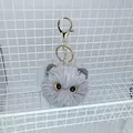 Grey plush cat head keychain with yellow eyes and golden metal lobster clasp - Gray