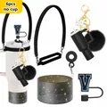 Detalle del juego de 6 accesorios de silicona negro y oro para vaso con asa y tapa - Estilo V (Letra V)