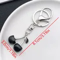 Minimalist black cherry charm keychain with silver-tone metal lobster clasp and chain - Silver Black Glossy Cherry Style (ER868)