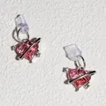 Boucles d'oreilles planète cœur rose avec anneaux de cristal sur fond blanc - Planète Cœur Amour
