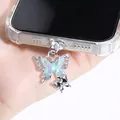 Bijou de téléphone papillon argenté avec strass bleus pour la décoration du port de charge - Papillon Irisé Bleu Argent En Strass