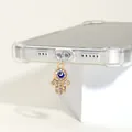 Pendentif de téléphone Main de Fatma dorée avec œil bleu et cristaux - Mauvais Œil Or