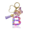 Purple resin letter B keychain with heart sequins, butterfly pendant, and purple tassel - Letter B (Style 1)
