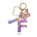 Portachiavi lettera F in resina viola con farfalla, cuore dorato e nappa coordinata - Lettera F (Stile 5)