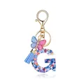 Porte-clés lettre G en résine avec paillettes cœur, gland bleu et pendentif papillon - Lettre G-Thème Paillettes Bleues (QS2157)