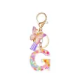 Resin letter G keychain with colorful flower sequins, purple tassel and butterfly charm - Letter G