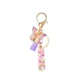 Initial letter I resin keychain with purple butterfly, glitter stars, and silk tassel - Style 9