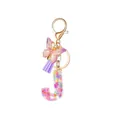 Letter J keychain with glitter resin, purple tassel, and butterfly charm for women - Letter J