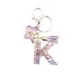 Resin letter K keychain with colorful star sequins, purple tassel, and butterfly charm - Style 11