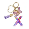 Portachiavi lettera X in resina viola con farfalla glitterata e paillettes cuore - Lettera X (Stile 22)
