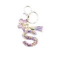 Resin letter S keychain featuring purple butterfly tassel and colorful star sequins - Style 19