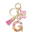 Pink resin letter G keychain with colorful heart sequins, butterfly charm and tassel - Letter G (Style 6)