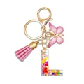 Pink resin letter L keychain with sequins, butterfly charm, and decorative tassel - Letter L (Style 11)