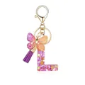 Porte-clés lettre L en résine avec pierres violettes, pompon et pendentif papillon - Lettre L-Thème Floral Violet Orange (QS2157)