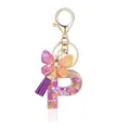Porte-clés lettre P en résine violette avec paillettes, papillon et pompon violet - Lettre P-Thème Floral Violet Orange (QS2157)
