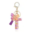 Porte-clés lettre T en résine avec pompons violets, papillon et clip doré - Lettre T-Thème Floral Violet Orange (QS2157)