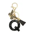 Porte-clés lettre Q en résine noire à paillettes avec papillon léopard et pompon noir - Lettre Q (Style 17)