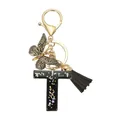 Porte-clés lettre T en résine avec paillettes noires, papillon doré et gland noir - Lettre T (Style 20)