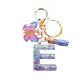 Porte-clés lettre E en résine avec paillettes violettes, pompon bleu et papillon - Lettre E Pailletée Violet-Bleu (QS2157)