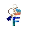 Porte-clés lettre F en résine avec paillettes bleues vertes, pompon et papillon - Lettre F Paillettes Bleu-Vert (QS2157)