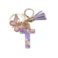 Porte-clés lettre T en résine violette avec étoiles, pompon et papillon - Modèle Lettre T (Style 18)