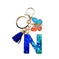 Porte-clés lettre N en résine bleue pailletée avec pompon et pendentif papillon - Lettre N Paillettes Dégradé Bleu-Vert (QS2157)