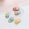 Set de 5 pinzas para el pelo con flores de colores para bebés en tonos suaves de macarrón - Flores de cuero
