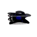 Close-up of black acetate cat hair claw clip with blue polka dots and glossy finish - Black