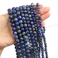 Strand of natural blue lapis lazuli round beads with golden pyrite flecks for DIY jewelry - Lapis Lazuli