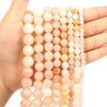 Polished natural orange agate round beads in multiple sizes from 2mm to 10mm - Pink Aventurine