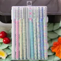 Set of 10 colorful gel pens in transparent box with floral and geometric patterns - Deskmate Theme Black Ink