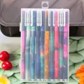 Set of 10 black ink gel pens with colorful nebula star patterns in a clear storage box - Starry Sky Series Black Ink