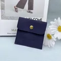 Navy blue suede envelope jewelry pouch with gold metal button and logo detail - Envelope Pouch / Navy Blue