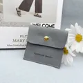 Elegant grey suede jewelry pouch with gold snap button and handmade jewelry logo - Envelope Pouch / Gray