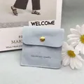 Light blue microfiber jewelry envelope pouch with gold button and handmade logo - Envelope Pouch / Light Gray