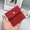 Red microfiber suede jewelry pouch with gold snap button and Handmade Jewelry logo - Red