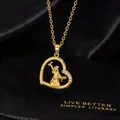 Detail of gold heart pendant with graduate silhouette and white zircon accents - Graduate Silhouette Heart Style (F)
